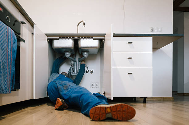 Professional Plumbing technician working in South Lyon, MI